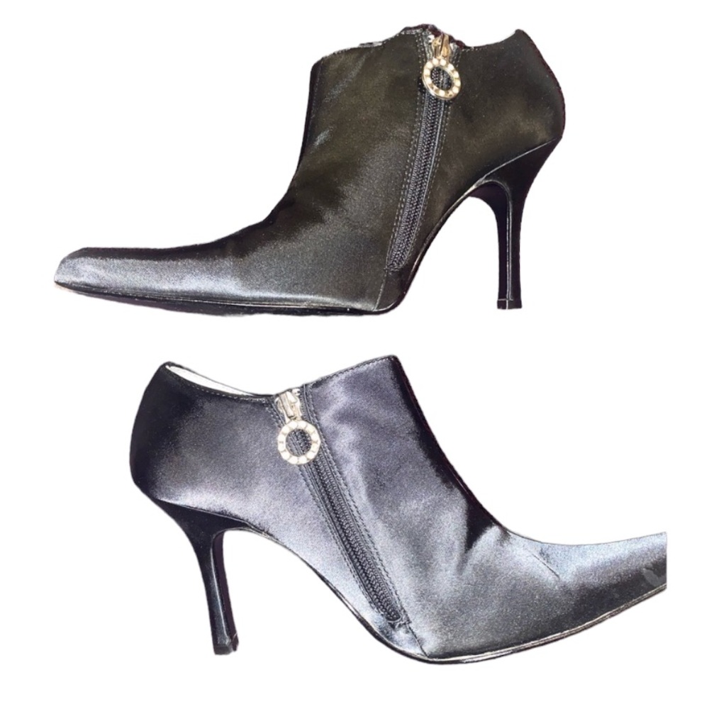 - Size 8 1/2 black heels with leather soul worn once with love